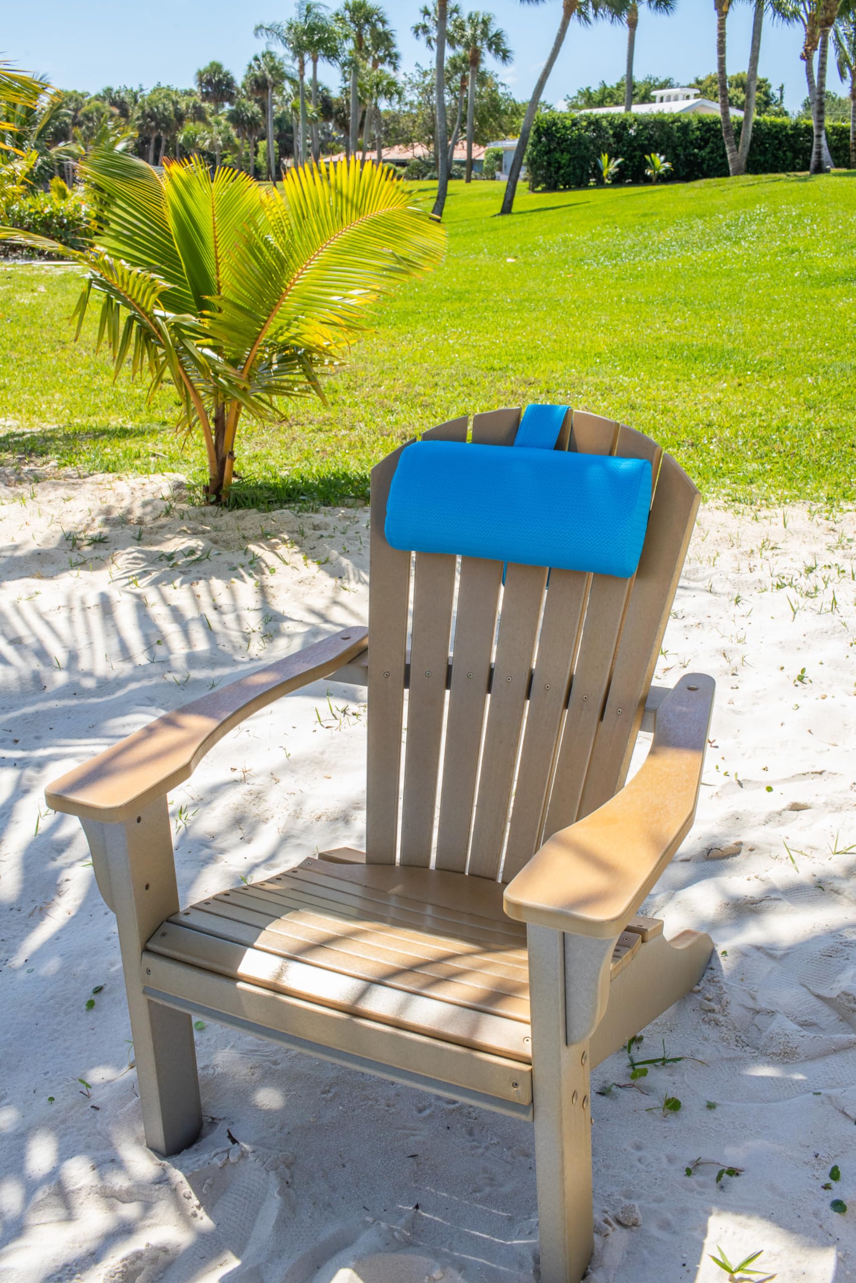 REZVANI headrest pillow used on spa or outdoor lounge setups.