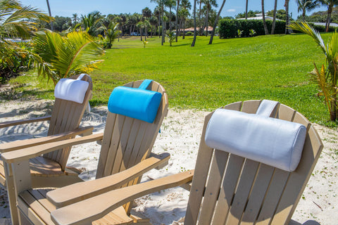 REZVANI Mountain Mist headrest pillow anchors to outdoor chairs with weighted tail.