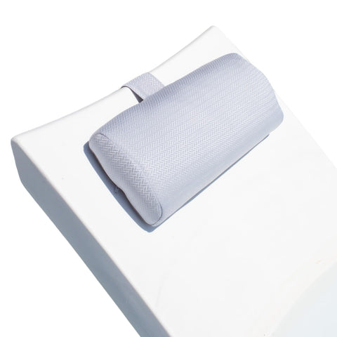 REZVANI Mountain Mist headrest pillow on a lounge for poolside relaxation.