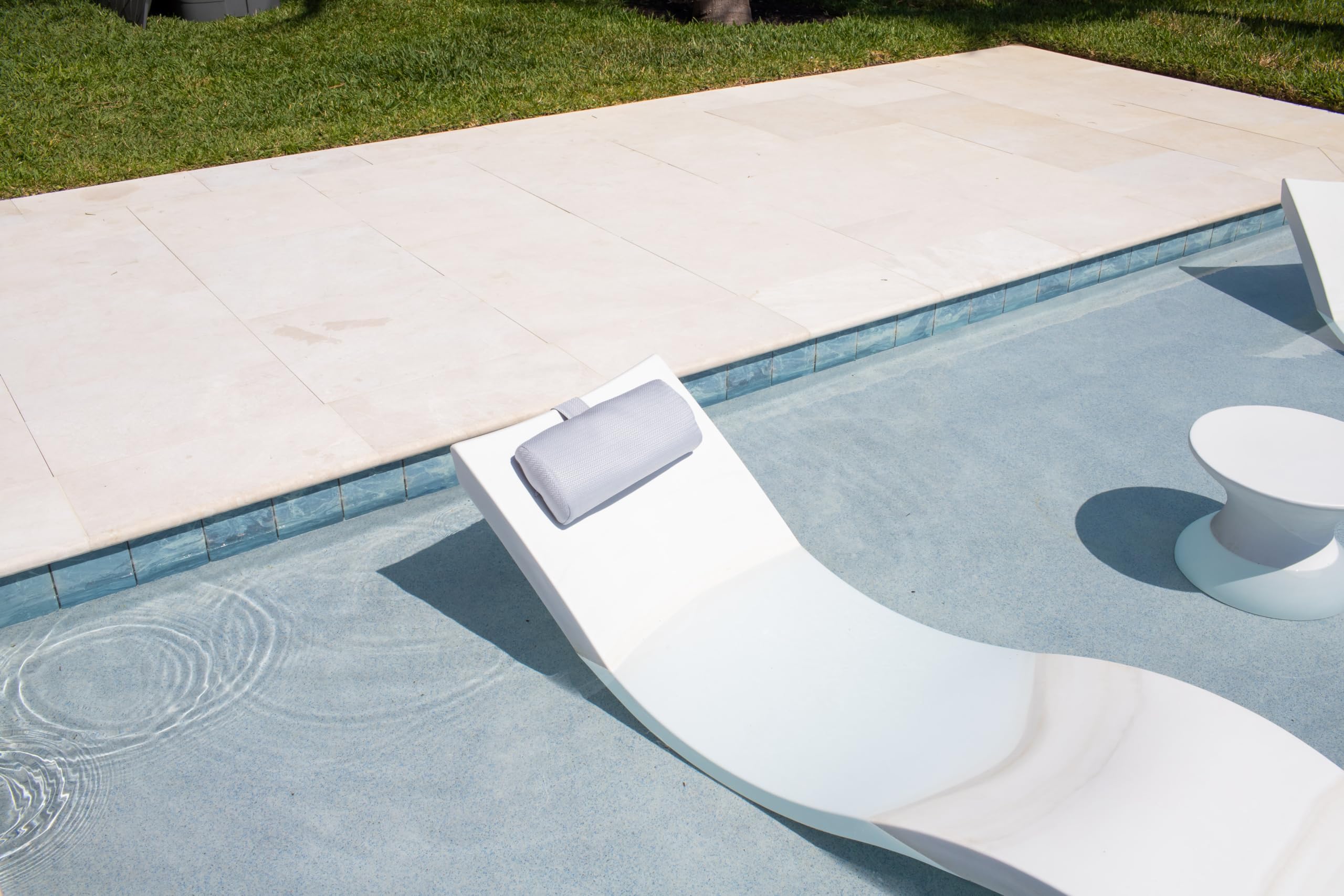 REZVANI Mountain Mist pillow features a cellphone pocket for easy sun-day essentials.