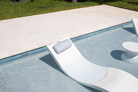 REZVANI Mountain Mist pillow features a cellphone pocket for easy sun-day essentials.
