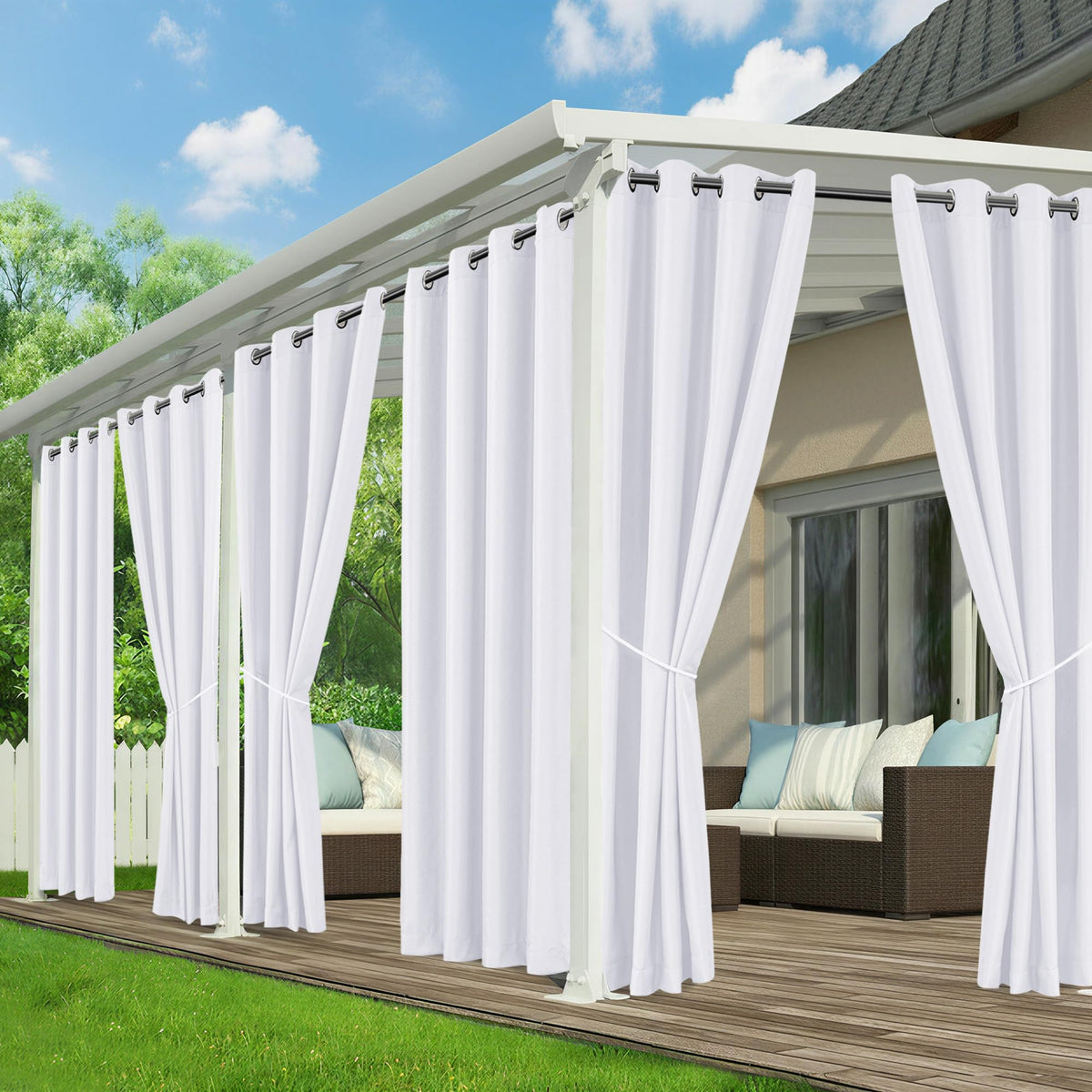 RichSets White patio waterproof curtains shield the patio from rain while maintaining a clean look.