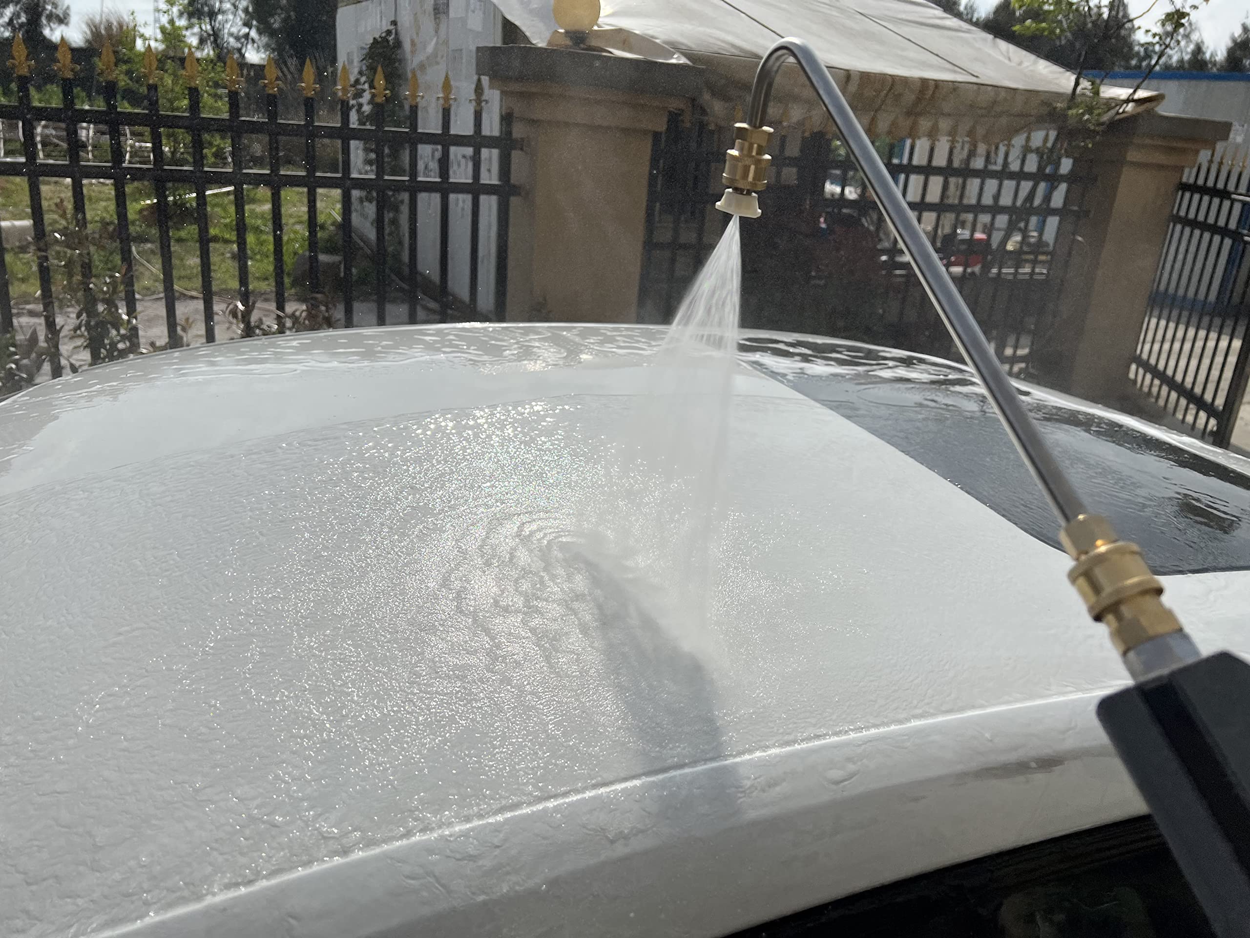 RIDGE WASHER gutter cleaner handles under-vehicle access for safe cleaning.