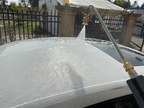 RIDGE WASHER gutter cleaner handles under-vehicle access for safe cleaning.