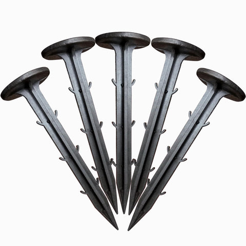 Rinteria 50-pack stakes with 4.3-inch tips securing weed barrier fabric.