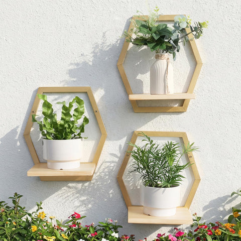 Rioneta diffuser and decor on hex shelf suggests aromatherapy-friendly setup