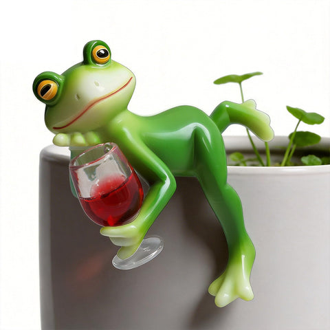 RJVZUKL Tipsy Frog Pot Hugger on a plant pot for a playful garden vignette