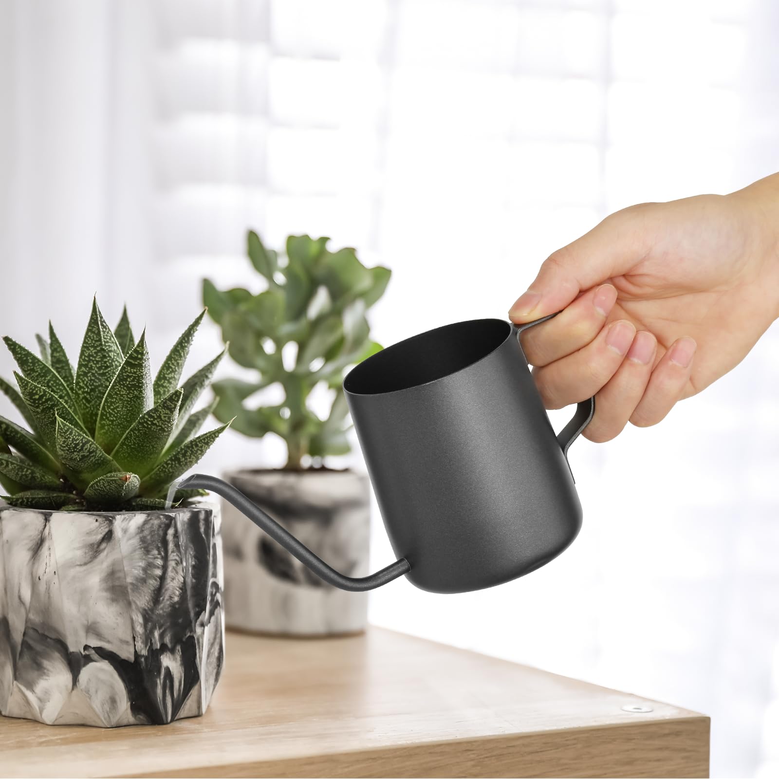 Roamall small watering can with compact design, ideal for tidy indoor watering.