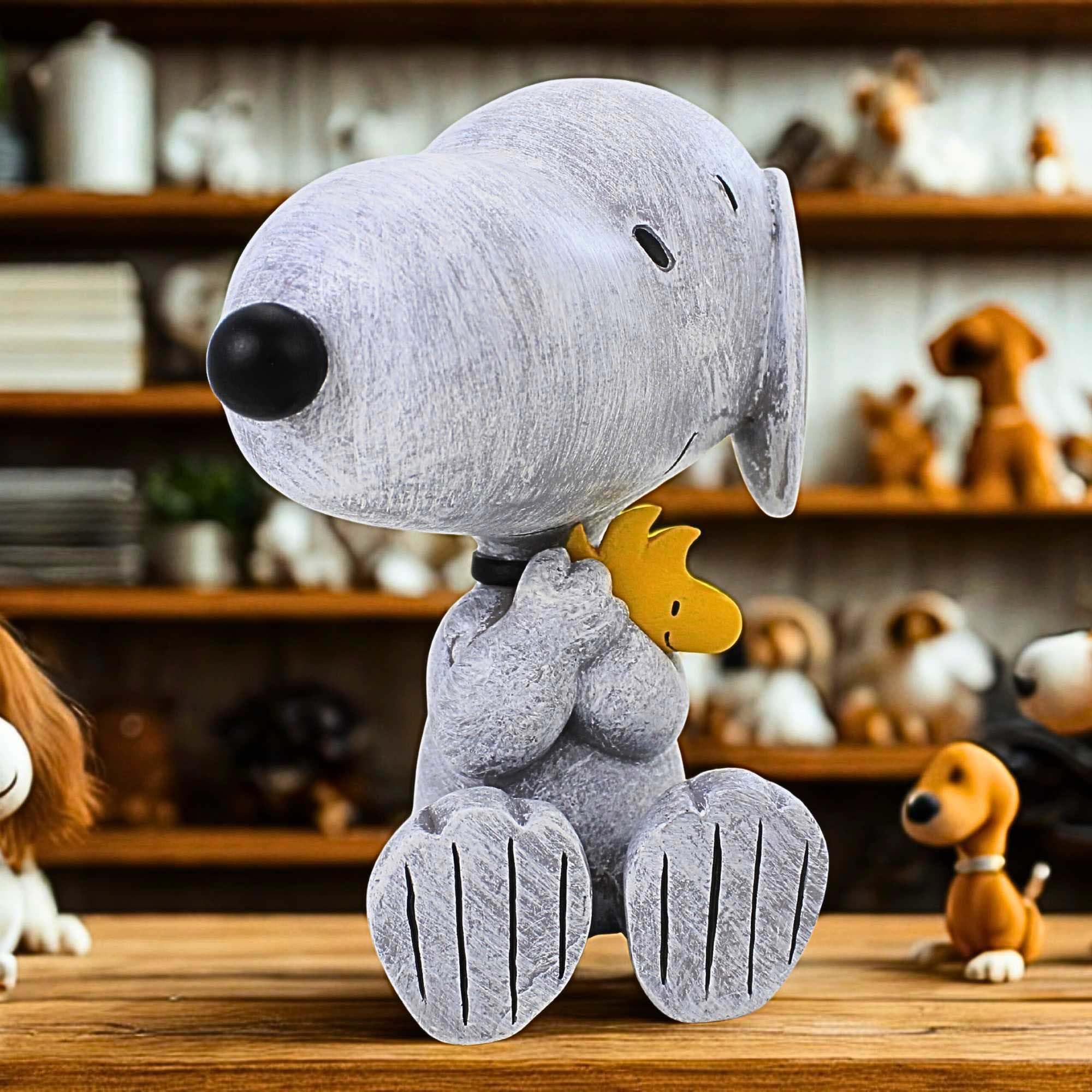 Roman Snoopy and Woodstock statue viewed from side, weather-ready for yard display.