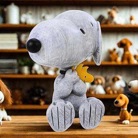 Roman Snoopy and Woodstock statue viewed from side, weather-ready for yard display.