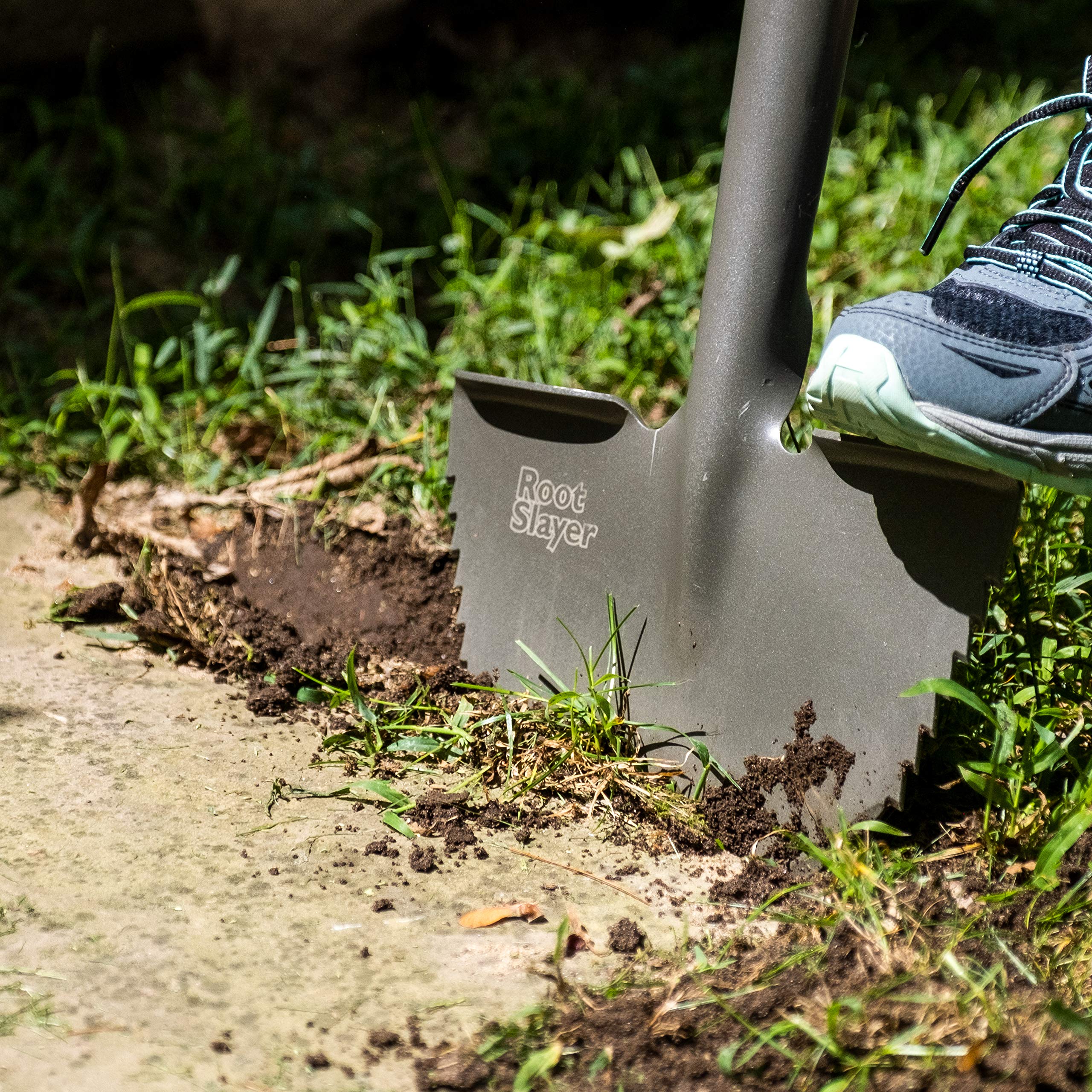 Root Slayer 22611 powder-coated blade resists rust during frequent edging tasks.