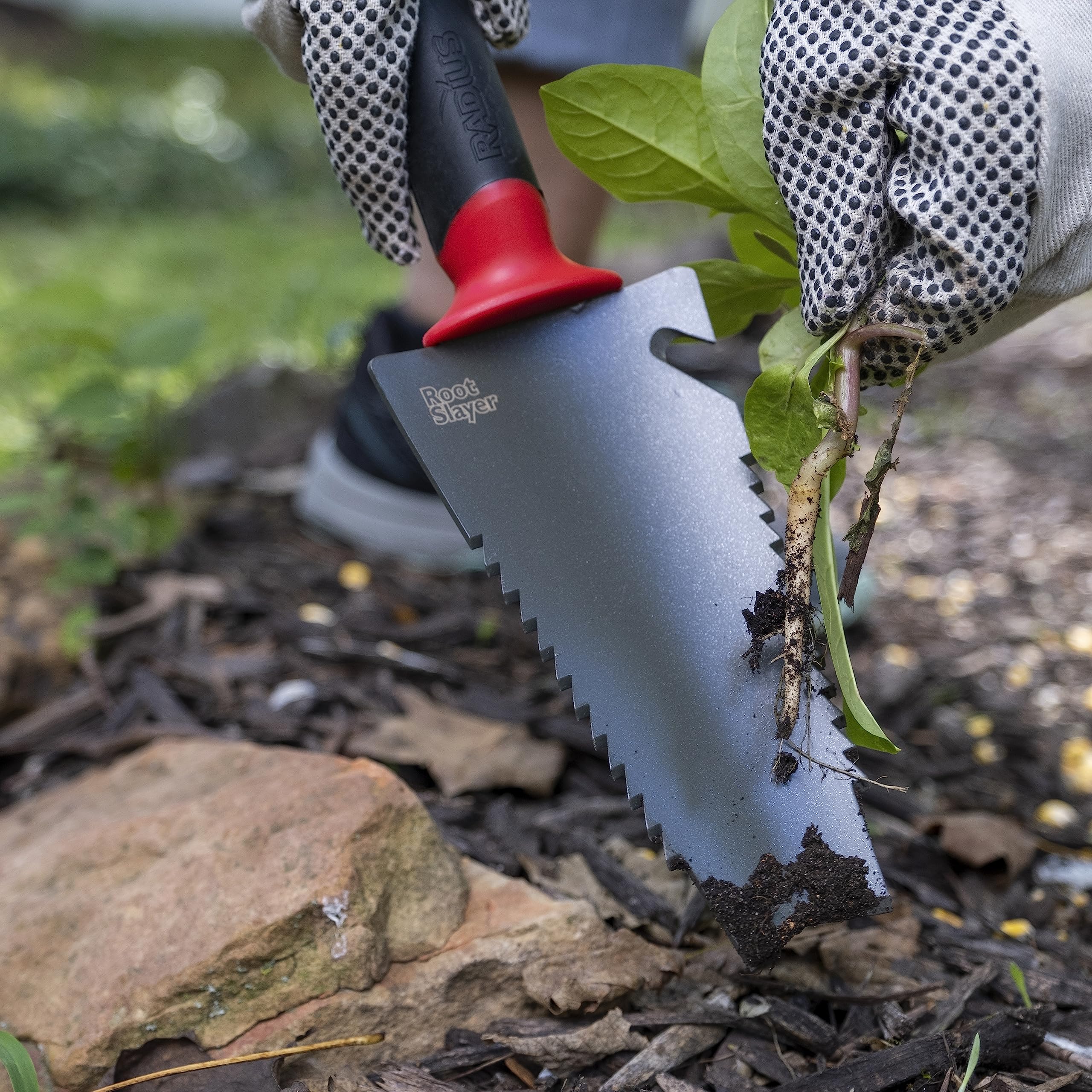 Root Slayer trowel durable carbon steel construction for long-lasting garden use.