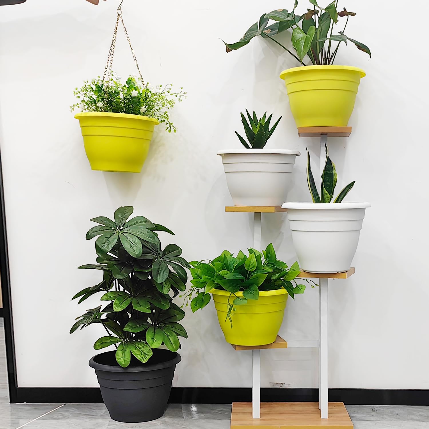 RooTrimmer yellow planter used for indoor decoration with medium plants.