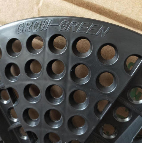 RootTrimmer pot in garden ready for planting and easy garden integration.