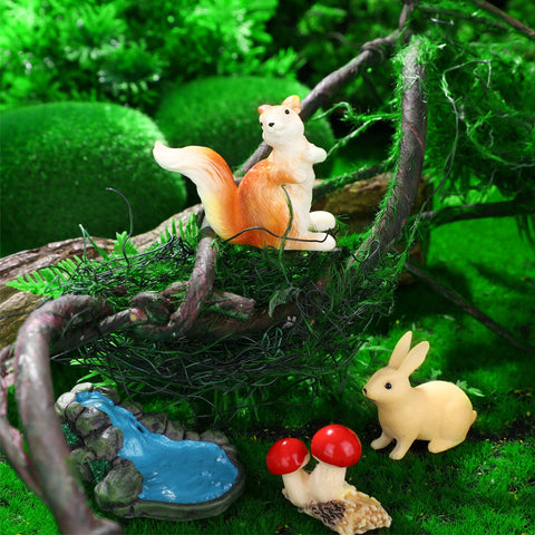 Roowest rabbit figurine adds charm to outdoor plant pots.