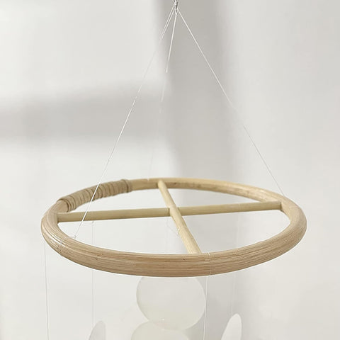 Rosojodg two-piece circle frames support customizable wind chimes and light-catching art.