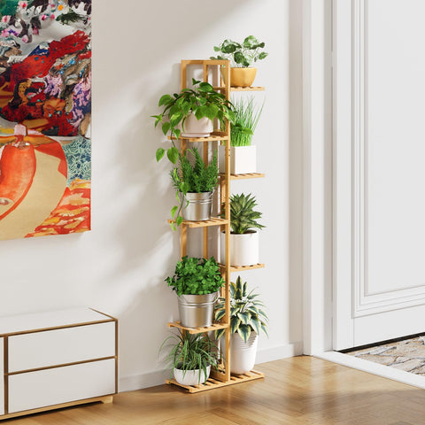 ROSSNY corner plant stand placed in a cozy nook for indoor greenery