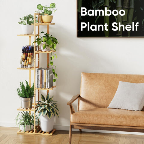 ROSSNY mid-century bamboo plant stand adds warmth to living room