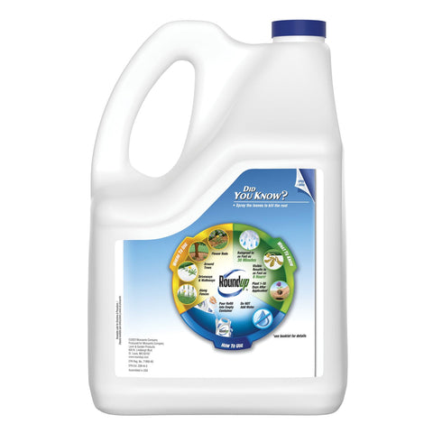Roundup Weed Killer addresses crabgrass along a driveway edge after application.