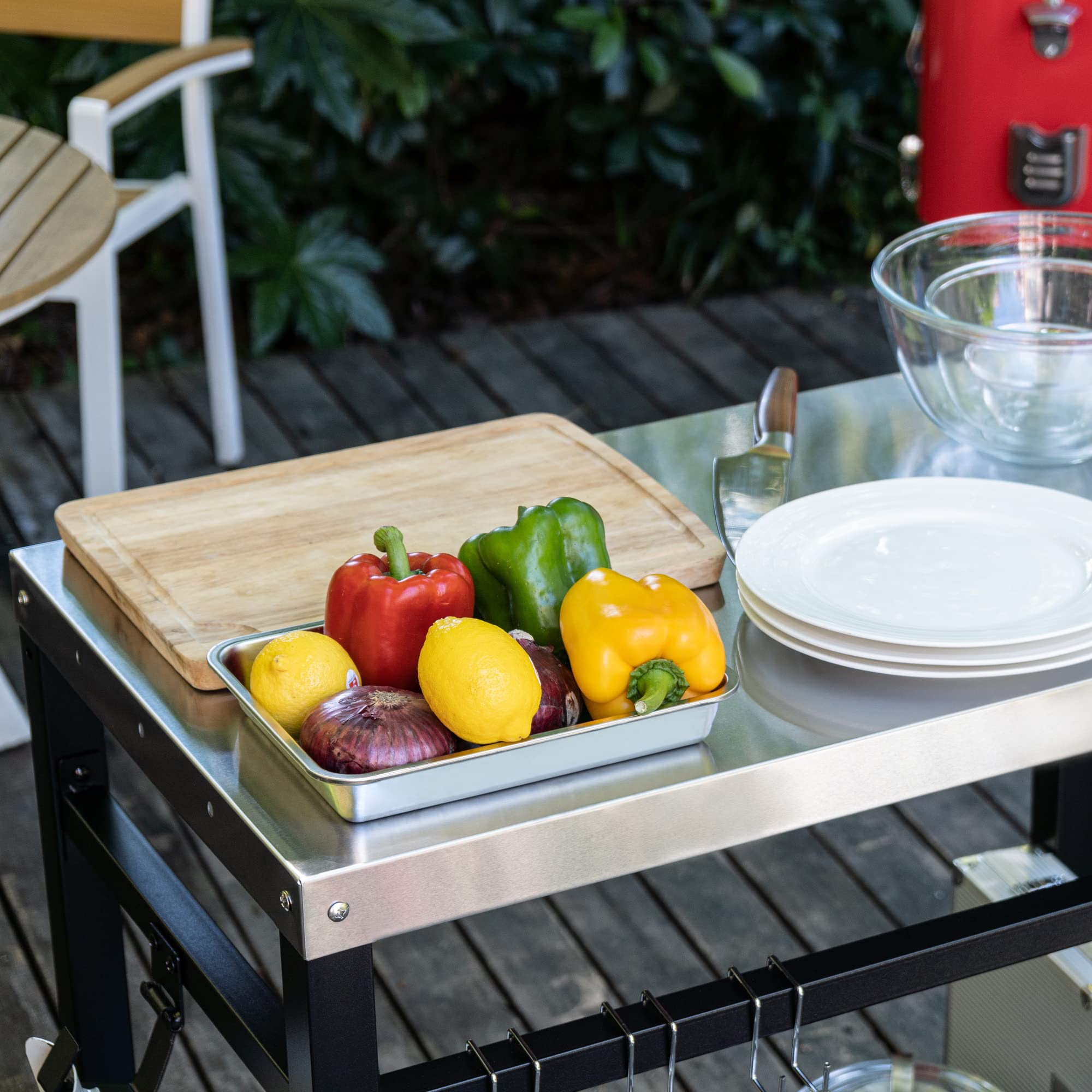 Royal Gourmet dining cart sturdy base stays steady on uneven ground.