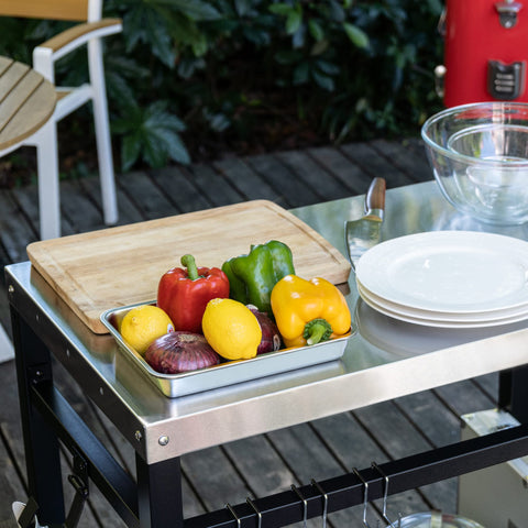 Royal Gourmet dining cart sturdy base stays steady on uneven ground.