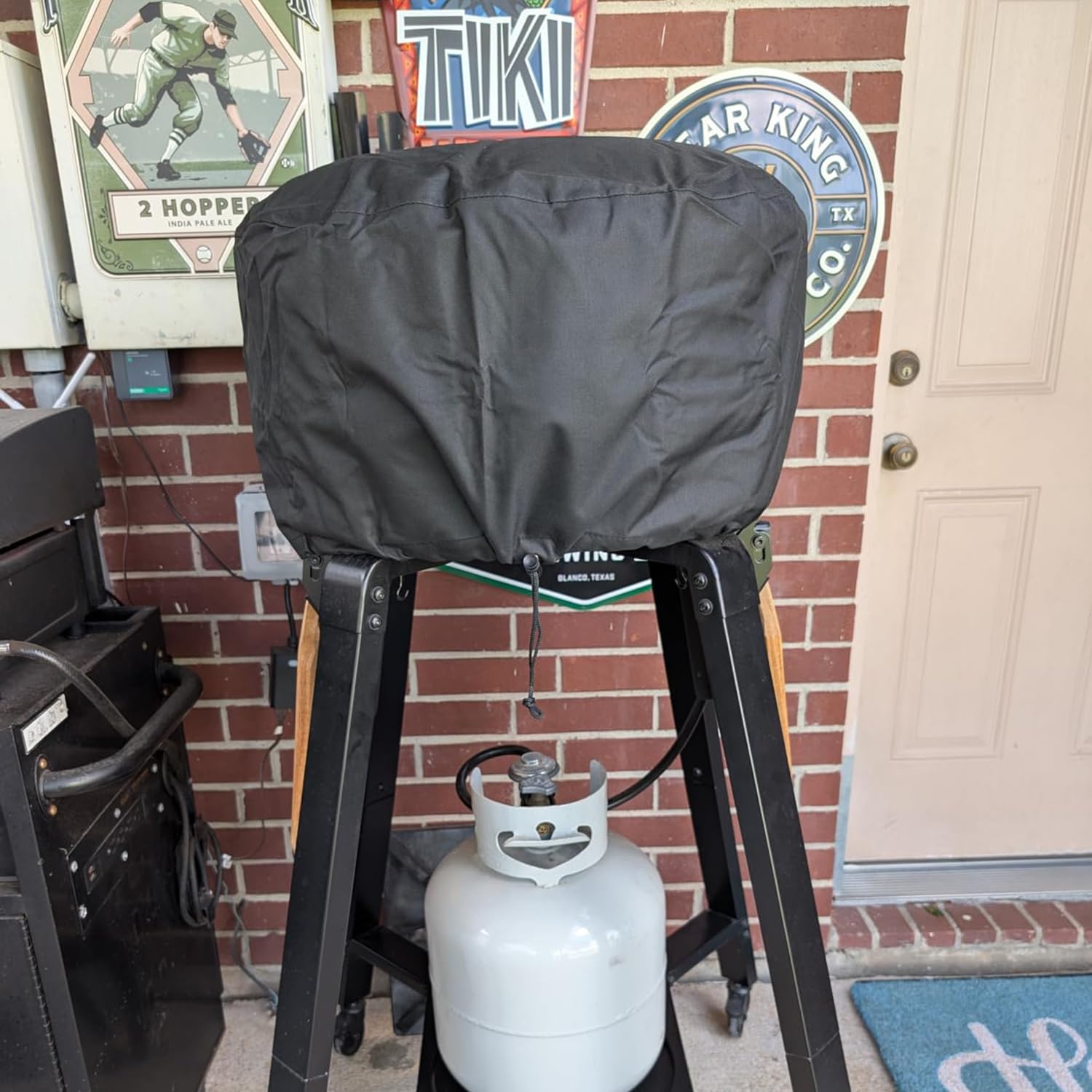 Rsipelsk Arc XL cover in use on a tabletop outdoor setup.