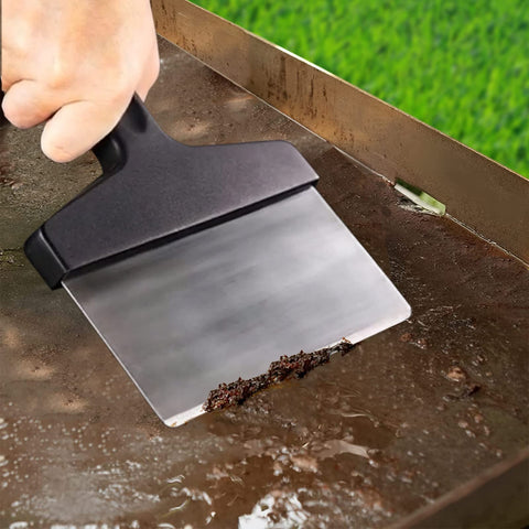 RTT Griddle Scraper in action for quick debris removal after cooking