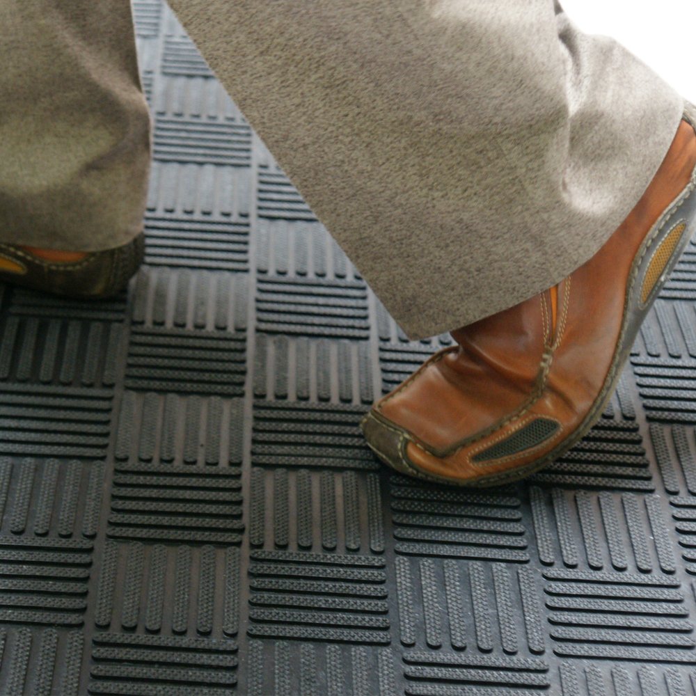 Black Rubber-Cal Dura-Scraper Checkered shows eco-friendly rubber composition.