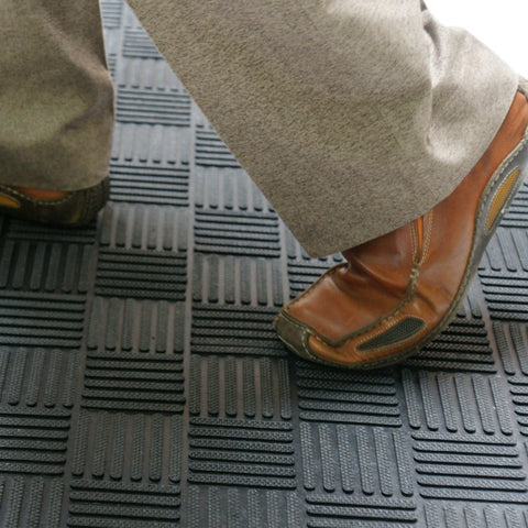 Black Rubber-Cal Dura-Scraper Checkered shows eco-friendly rubber composition.