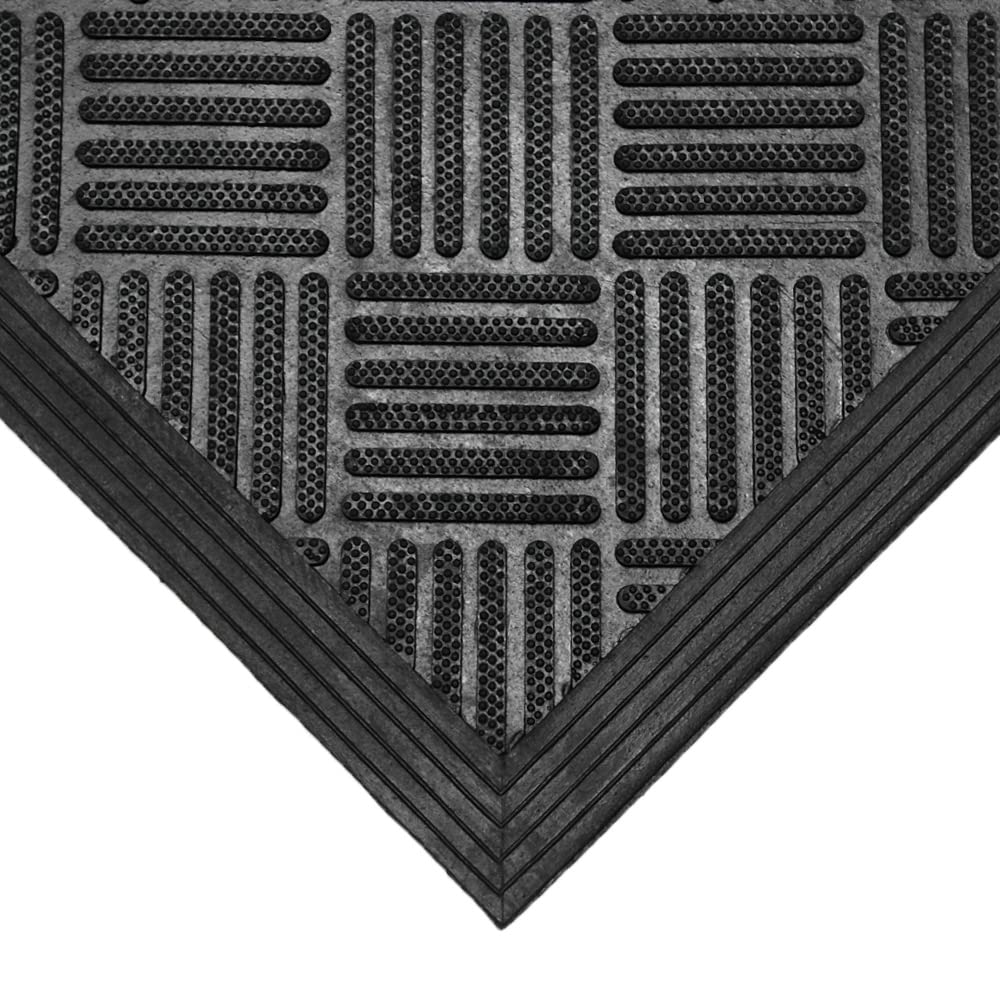 Rubber-Cal Dura-Scraper Checkered in a commercial doorway for high-traffic use.