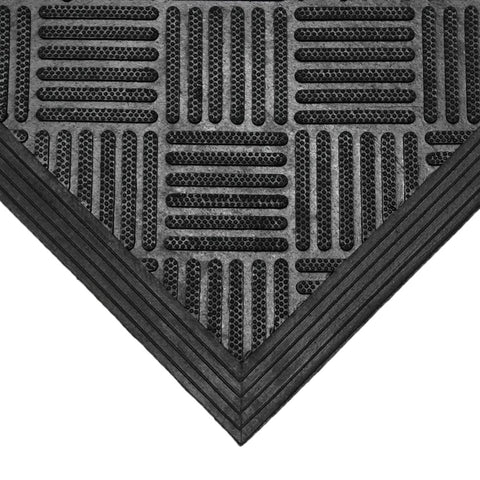 Rubber-Cal Dura-Scraper Checkered in a commercial doorway for high-traffic use.