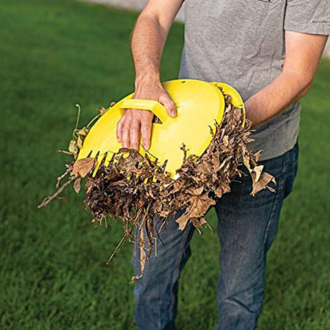 Rugg Original Leaf Scoops lifting large piles of leaves with sturdy teeth.