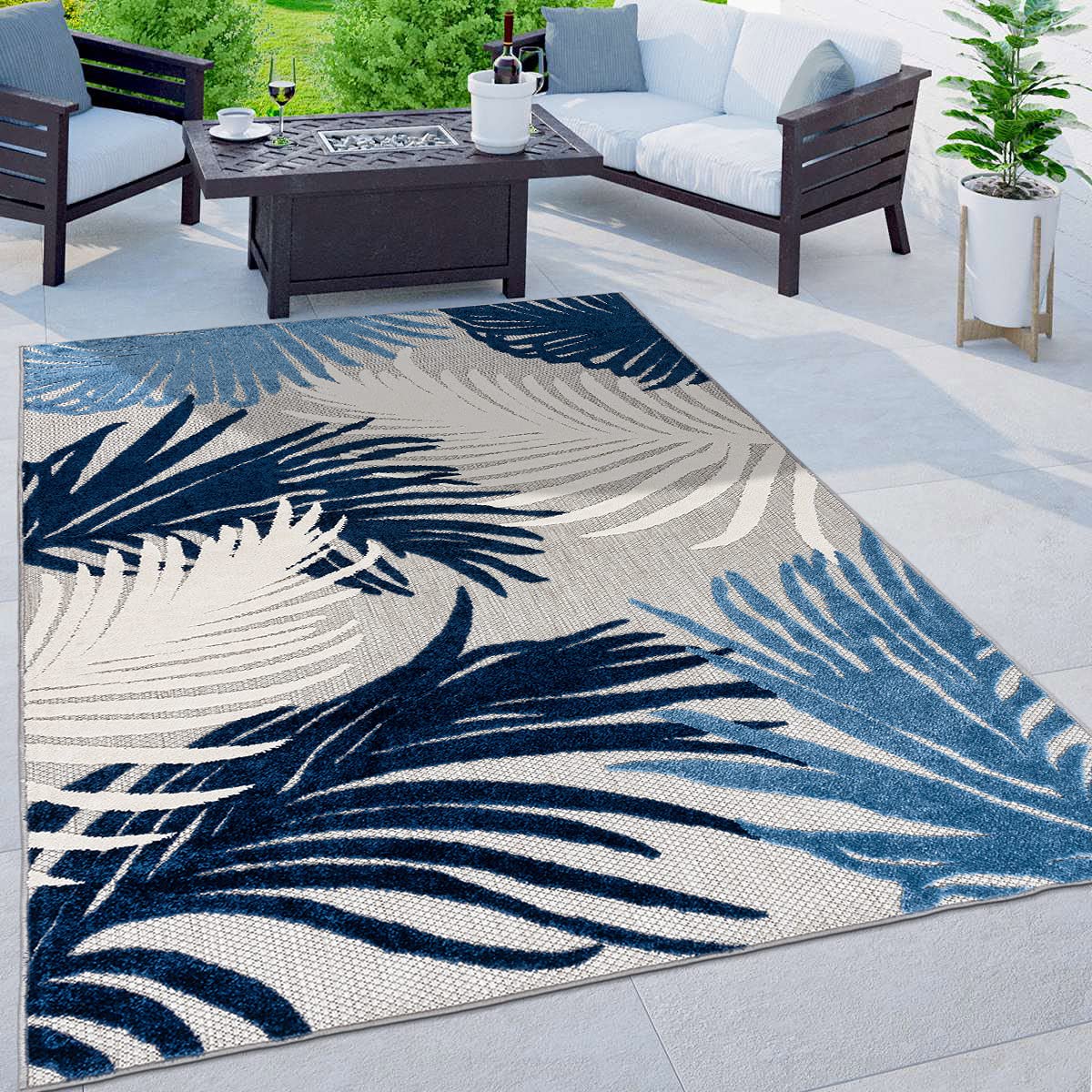 Rugshop navy Lucca floral outdoor rug adds contemporary charm to patios.