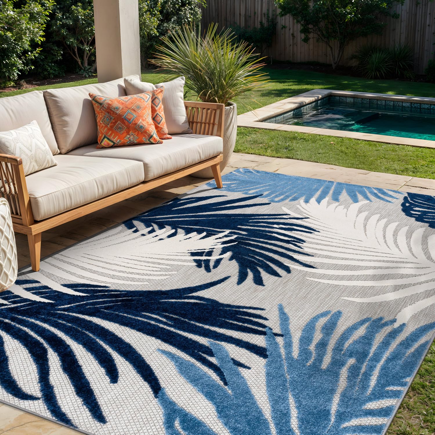 Rugshop Navy Lucca floral outdoor rug adds contemporary charm to patios and decks.