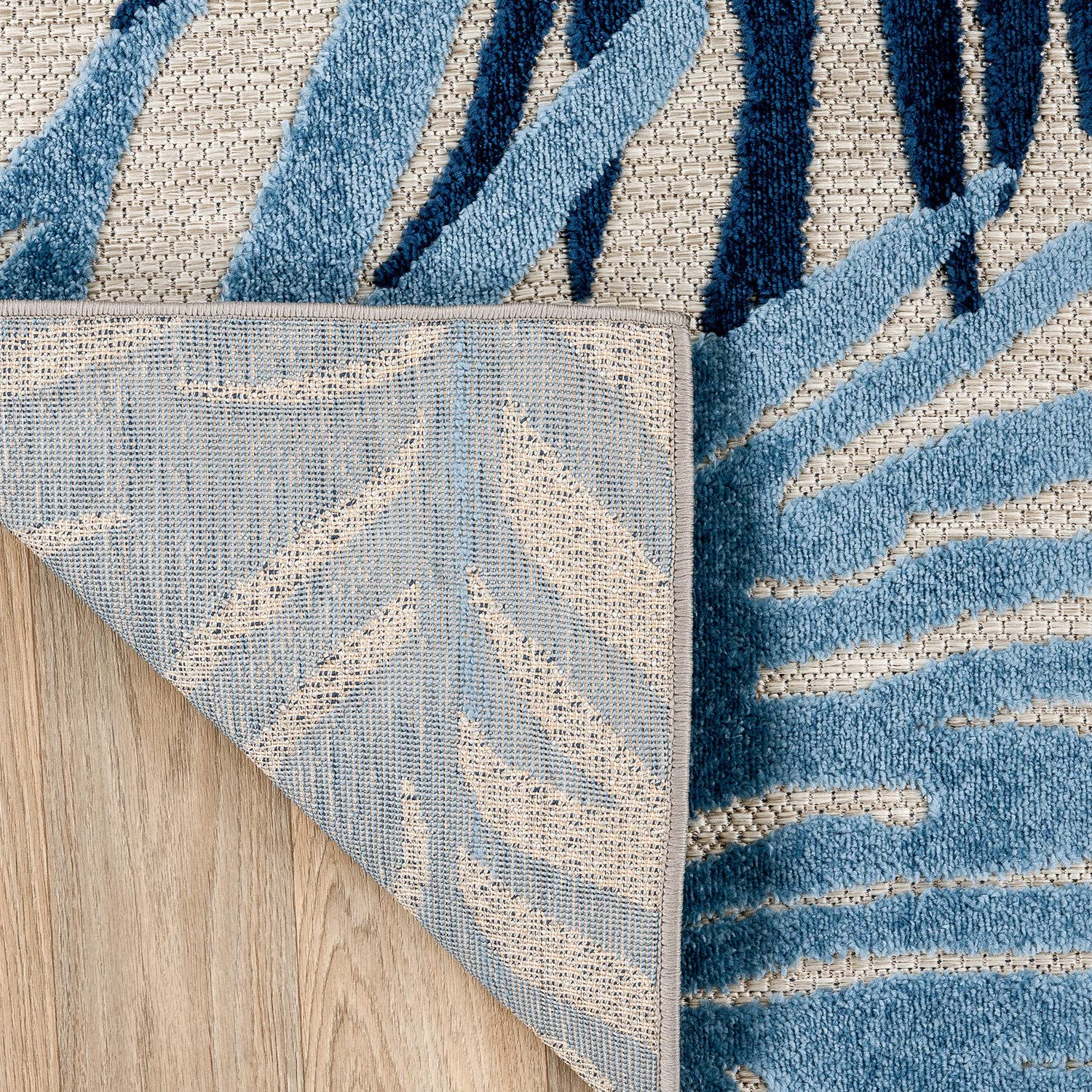 Rugshop Navy Lucca stain resistance underlines easy cleanup after spills and pets.