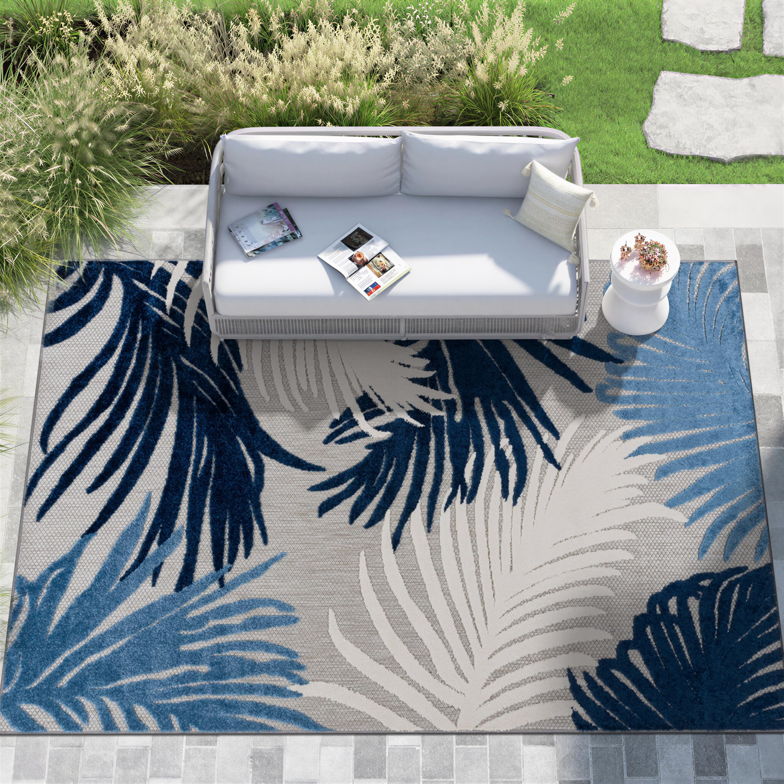Rugshop polypropylene outdoor rug resists wear in high-traffic areas.