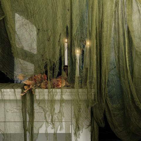 RunNico green creepy cloth wall decor adds eerie ambiance indoors.