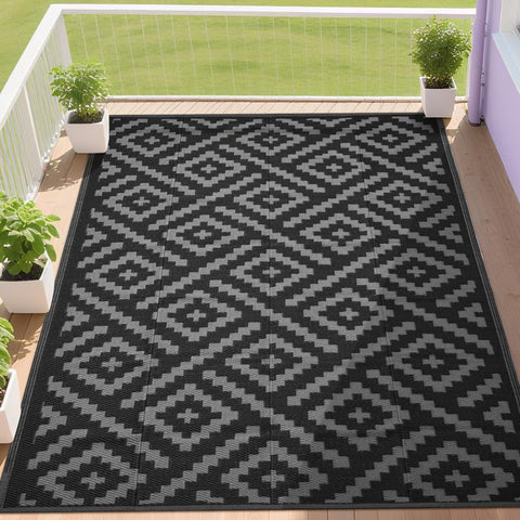 Rurality outdoor rug 9x12 on patio shows weather resistance and UV protection.