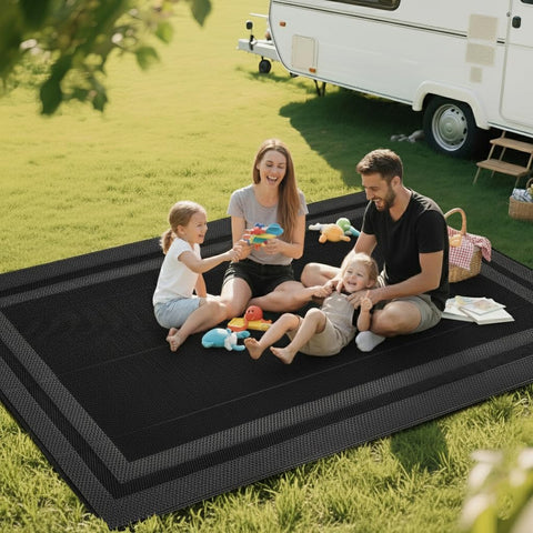 RURALITY UV-resistant plastic straw rug maintains color in sun.