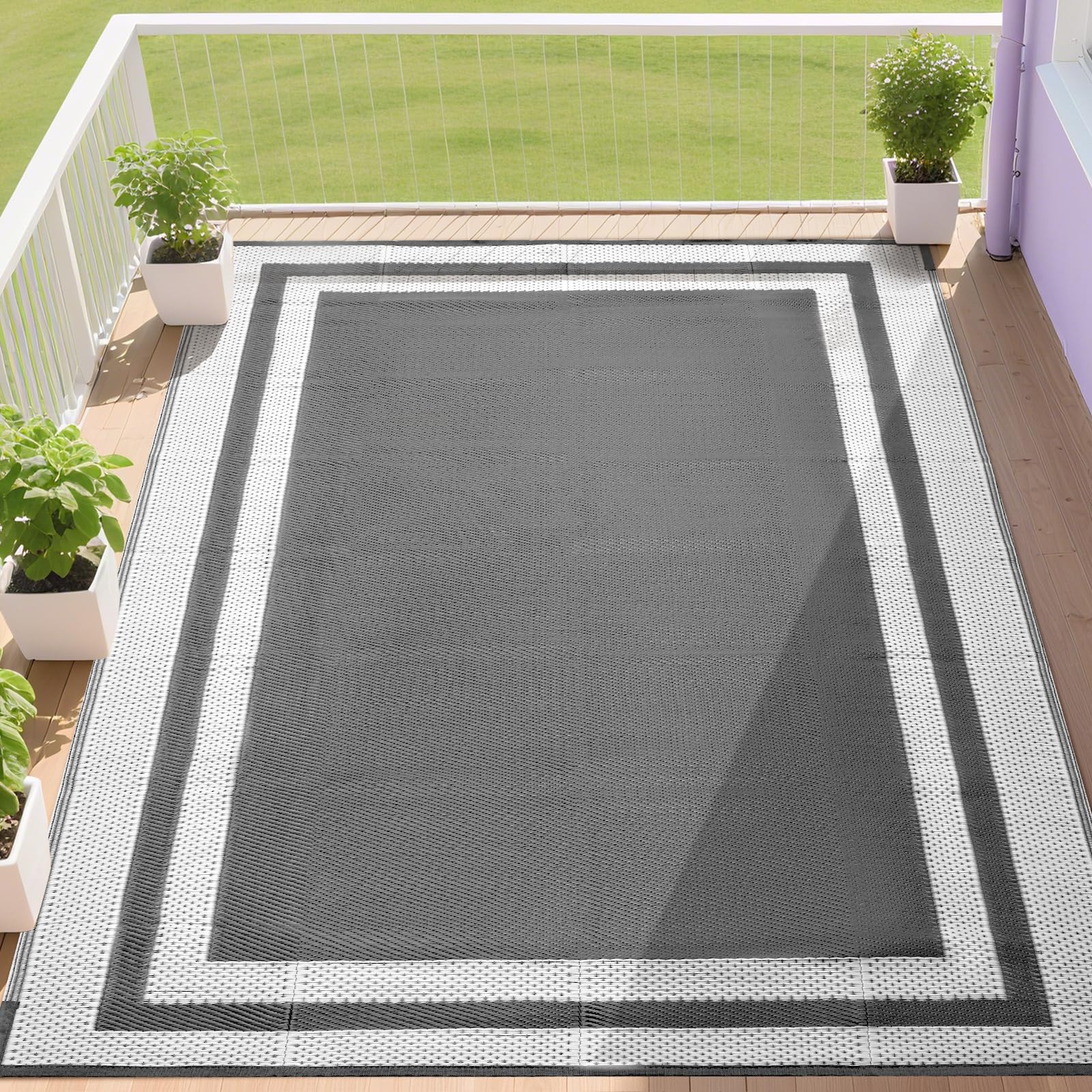 Rurality reversible outdoor rug hemmed edge for two looks.