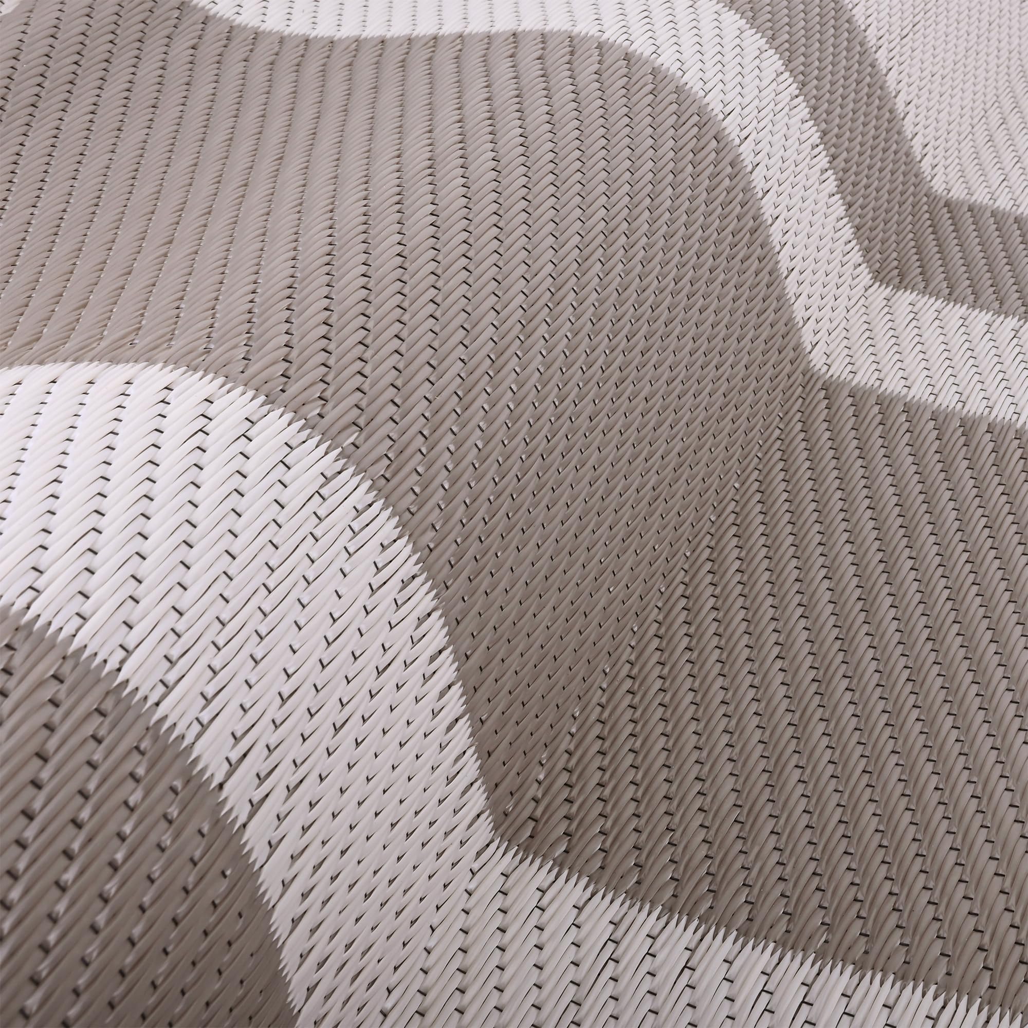 RURALITY rug with reversible design highlighting two looks for outdoor use