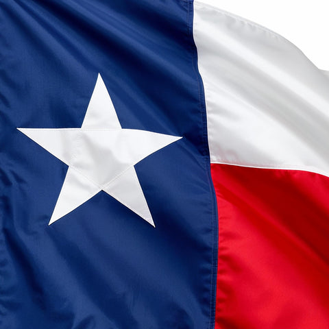 Rushmore Rose Texas Flag 3x5 heavy-duty outdoor flag fluttering boldly on a pole.