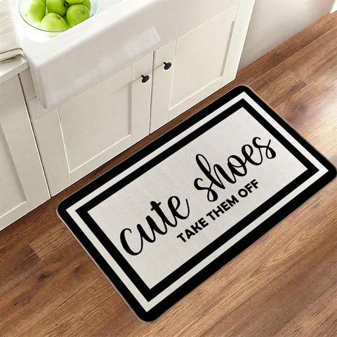 RYKEEN indoor-outdoor mat in gray with non-slip backing for versatility