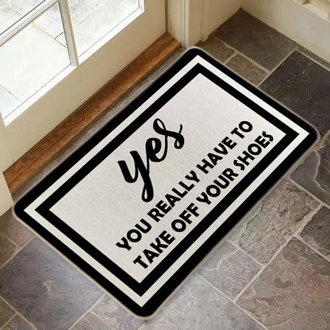 RYKEEN Yes You Really Have to Take Off Your Shoes Door Mat is durable and stain resistant.