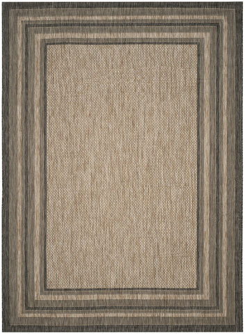 Safavieh Courtyard outdoor deck scene emphasizes weather resistance and durable pile.