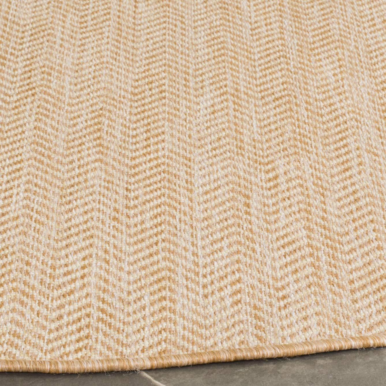 Safavieh Courtyard outdoor rug with quarter-inch pile boosts longevity in high-traffic entryways.