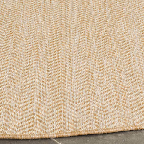 Safavieh Courtyard outdoor rug with quarter-inch pile boosts longevity in high-traffic entryways.