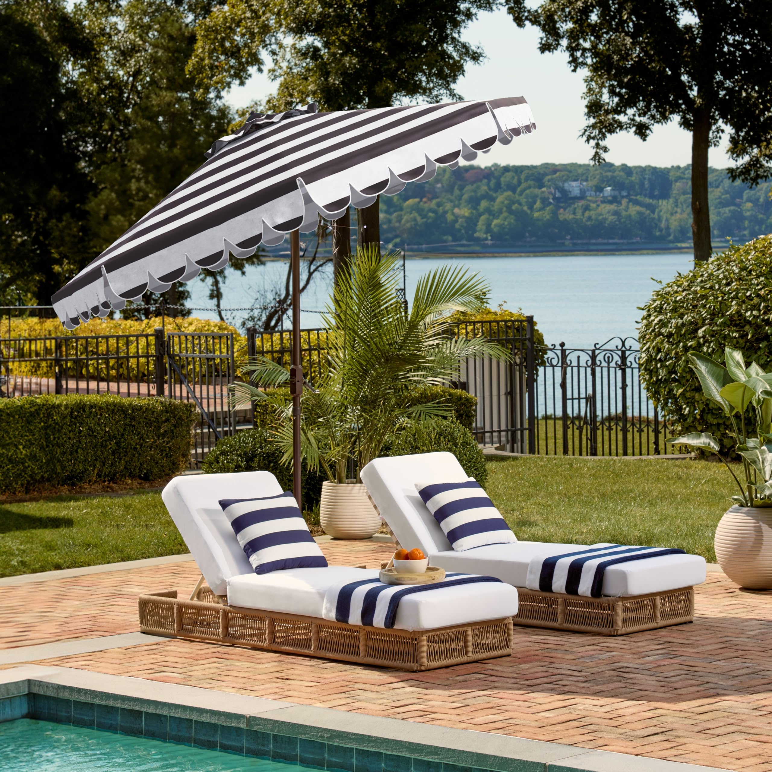SAFAVIEH Maui umbrella offers versatile shade for outdoor gatherings.