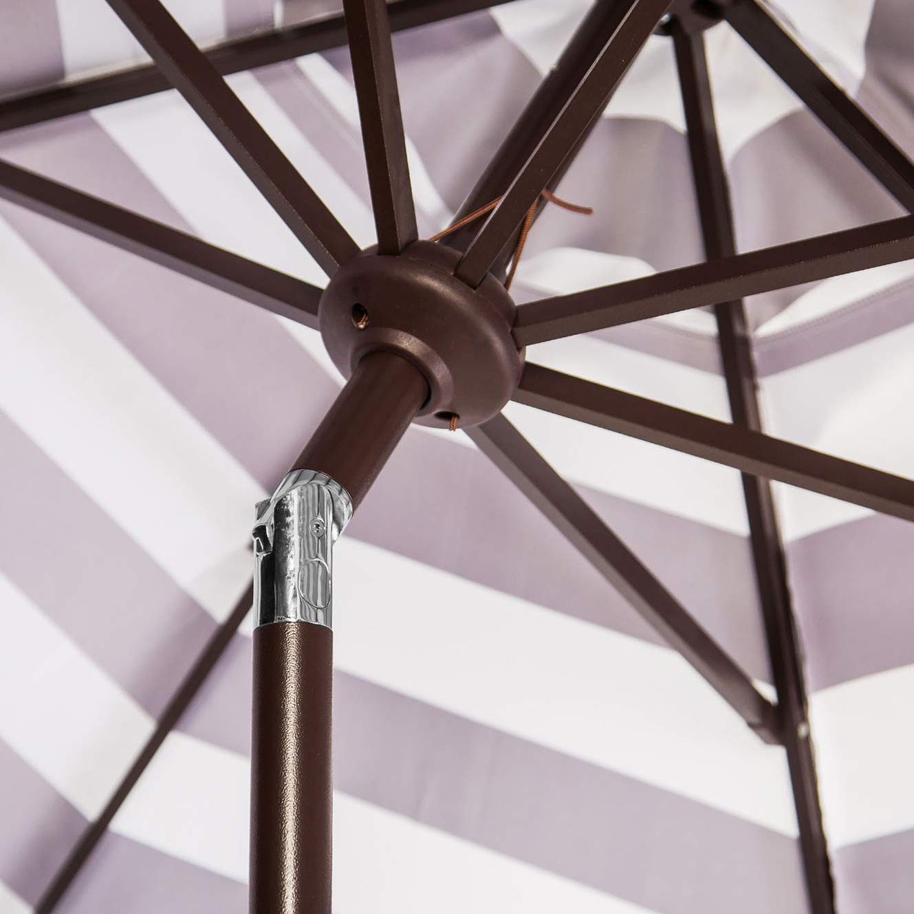 SAFAVIEH Maui polyester canopy UV resistant to preserve color.