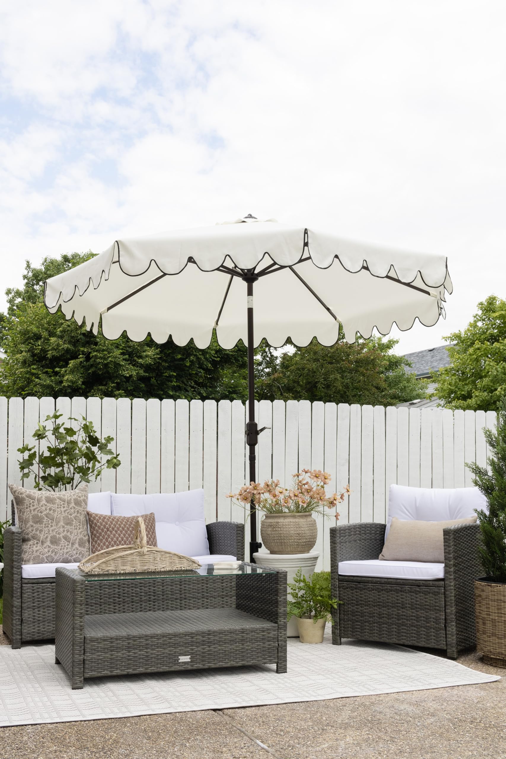 Safavieh Venice umbrella poolside shade during sunny afternoons.